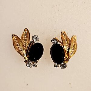 Vintage gold tone clip-on earrings clear rhinestones matte black stone Unsigned